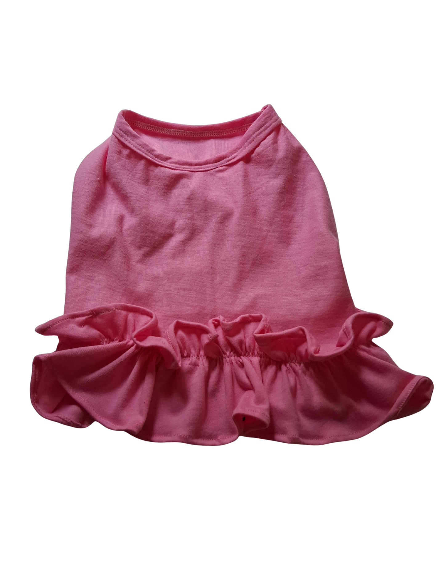 Pink dog dress with ruffled skirt on a white background