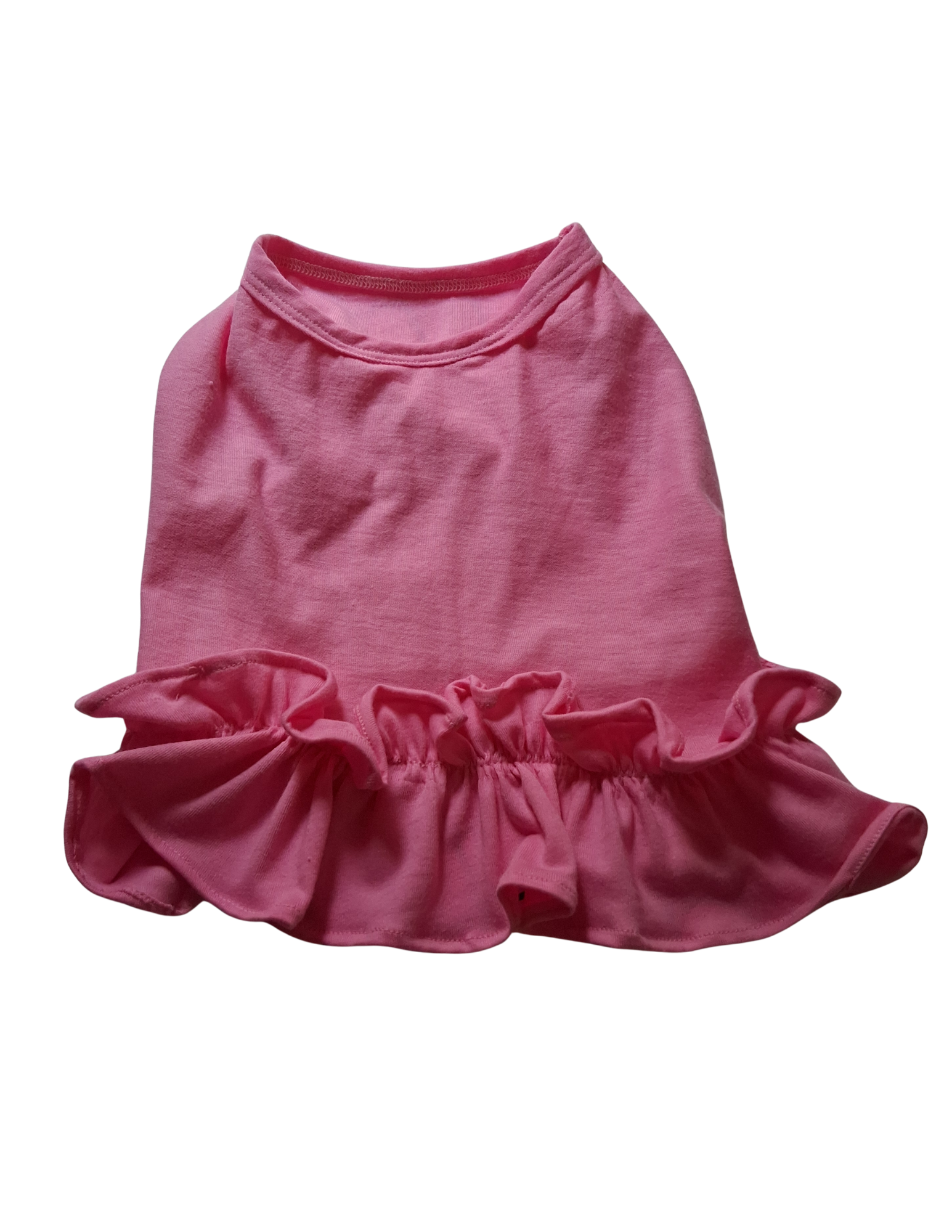Pink dog dress with ruffled skirt on a white background
